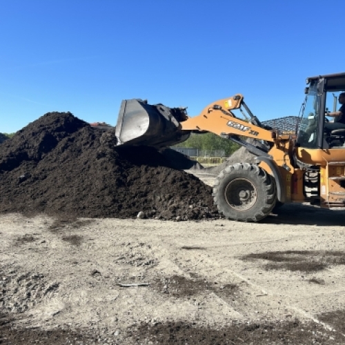 Bortkørsel af jord med grab og maskine fra byggeplads