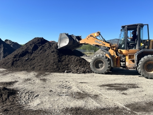 Bortkørsel af jord med grab og maskine fra byggeplads